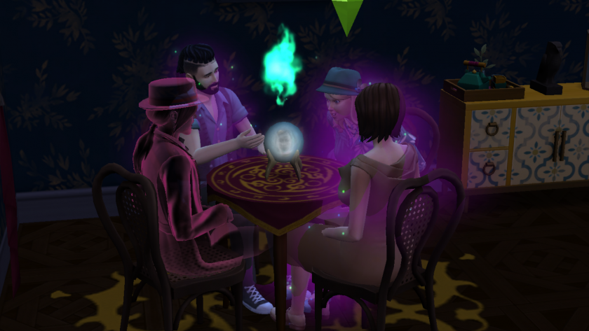 Vier Sims, darunter ein Geist, sitzen an einem Séancetisch und schauen auf die Zauberkugel, die einen Geist zeigt.